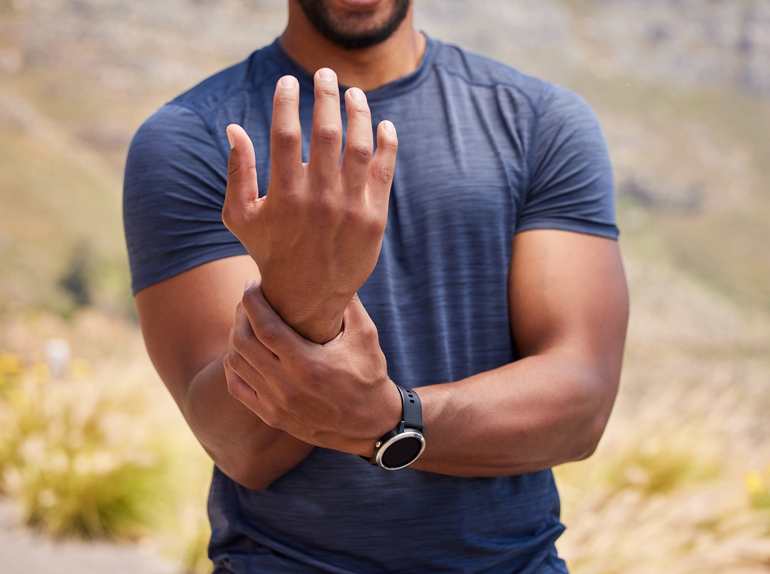 Man holding his wrist
