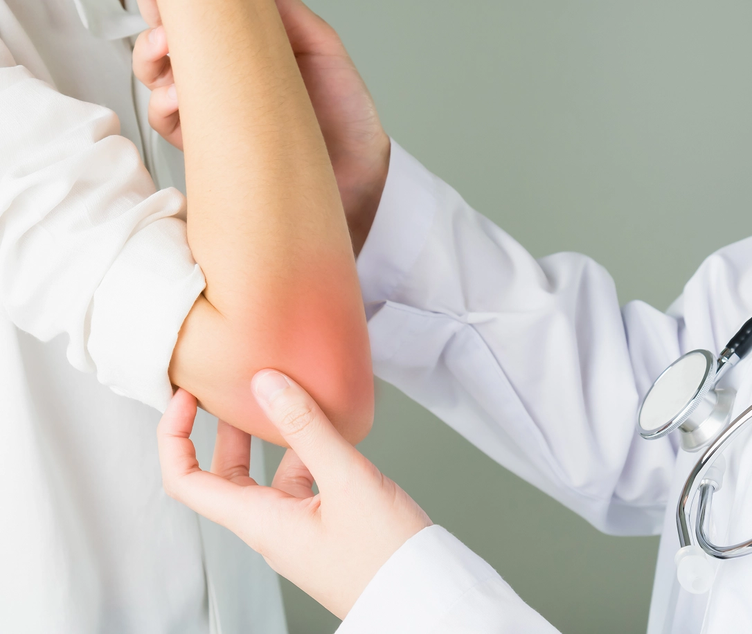 Doctor holding a child's elbow