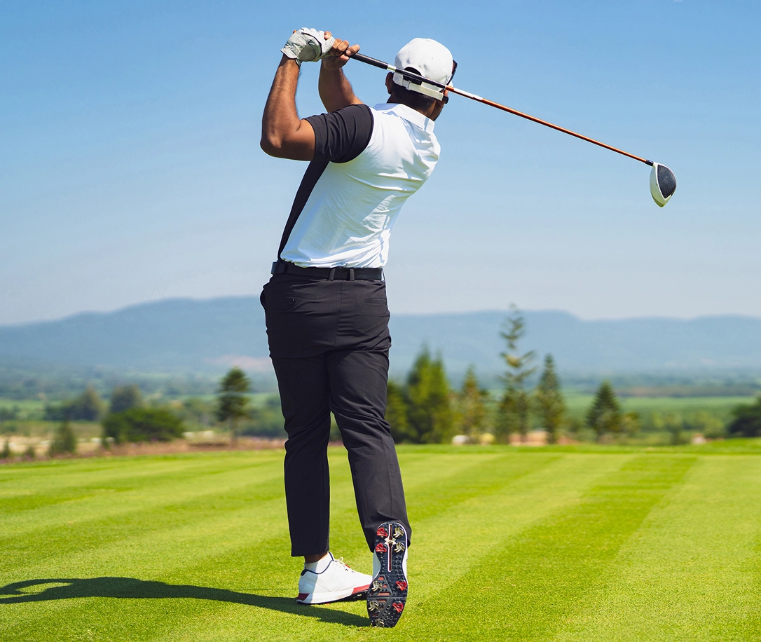 Man swinging golf club